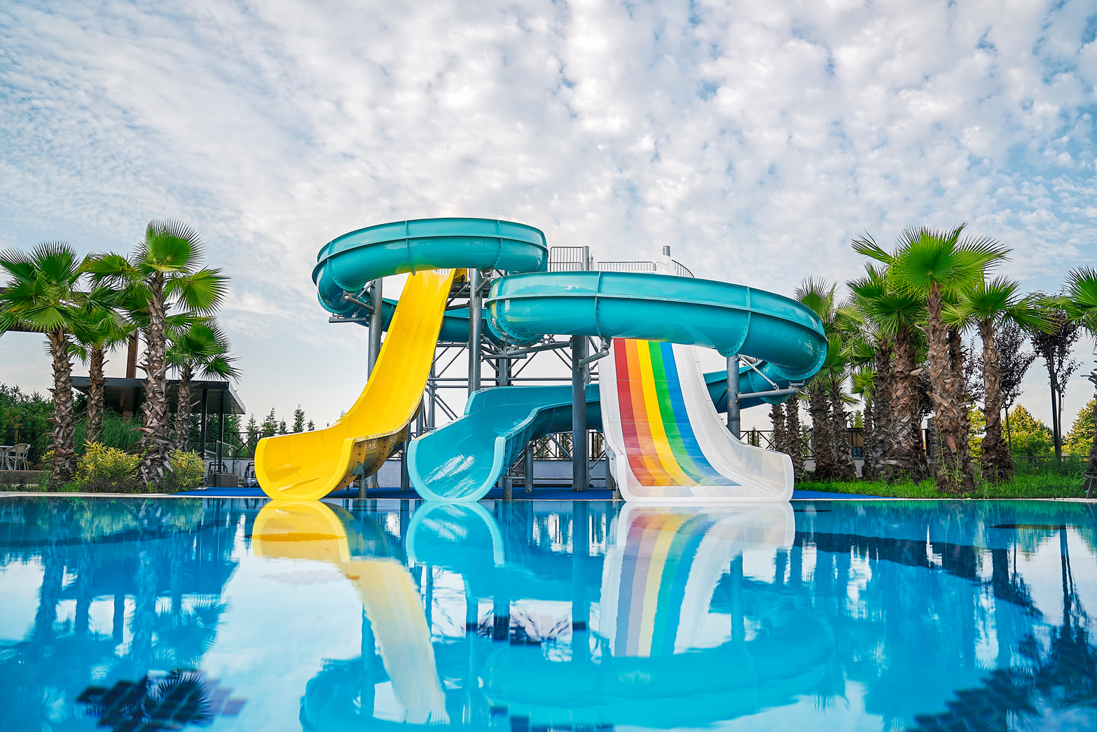 Water slide at water park. swimming pool at luxury hotel